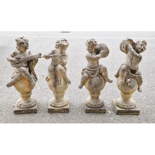 1351 - Set of four composite stone garden statues in the form of musical putti playing tambourine, mandolin... 