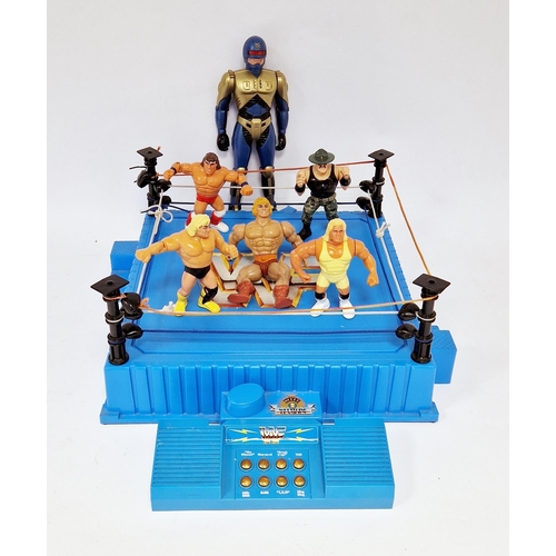 538 - Hasbro WWF Official Wrestling Ring with Live Action Sound Effects together with wrestlers to include... 