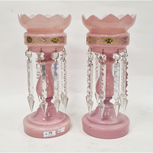 75 - Large pair of Victorian pink glass lustres, gilt and enamelled with oval panels of flowerheads, on b... 