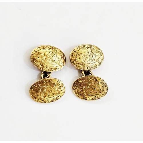 317 - Pair of 18ct gold cufflinks by Saunders and Shepherd, London 1899, of oval form with engraved foliat... 