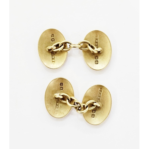 317 - Pair of 18ct gold cufflinks by Saunders and Shepherd, London 1899, of oval form with engraved foliat... 