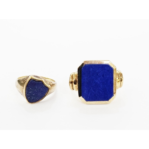 320 - Gold coloured signet ring set with shield shape lapis lazuli, unmarked, 5gms approx, size J 1/2, and... 