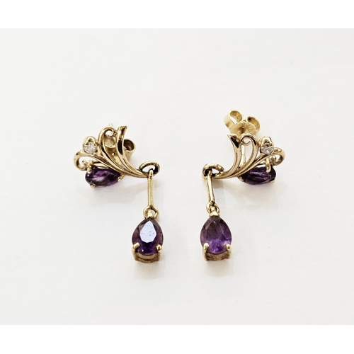 329 - Pair of 9ct gold stud earrings, each set with a teardrop amethyst and diamond within the scrolling s... 