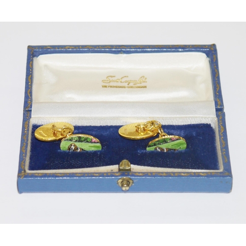 369 - Pair of 18ct gold cufflinks of oval form, enamelled with a bassett hound in a garden, with chain lin... 