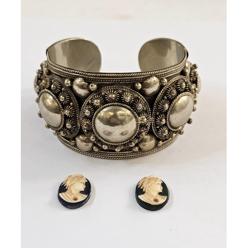 503 - Thai white metal bangle with wirework decoration, marked Siam Sterling, and two cameos of ladies (3)