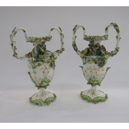 56 - Pair of English porcelain Coalbrookdale two-handled rocaille flower-encrusted vases, circa 1835, gre... 