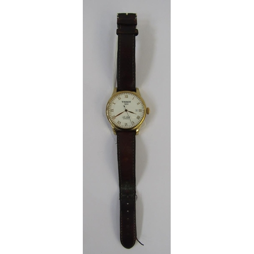 598 - Gentleman's gilt metal Tissot Le Locle automatic strap watch, the dial with gilt Roman numerals and ... 