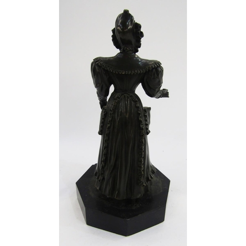 108 - Bronze figure of a lady dressed in a bonnet and dress with aperture to her pocket, on octagonal marb... 