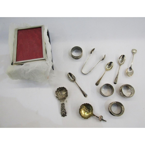 269 - Collection of silver items including four napkin rings, sugar tongs, Queen Elizabeth II silver jubil... 