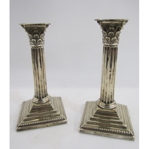 272 - Pair of Victorian / Edward VII silver candlesticks, Sheffield 1901, Henry Hobson & Sons, of Corinthi... 