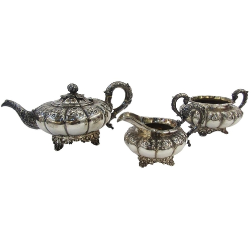 295 - George IV silver three-piece teaset with teapot, two handled sugar basin and cream jug, each piece o... 