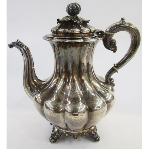 296 - William IV silver coffee pot, baluster shape and panelled with melon and foliate finial, scroll hand... 