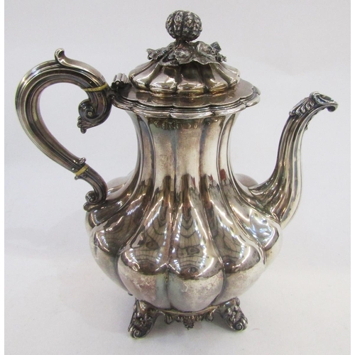 296 - William IV silver coffee pot, baluster shape and panelled with melon and foliate finial, scroll hand... 