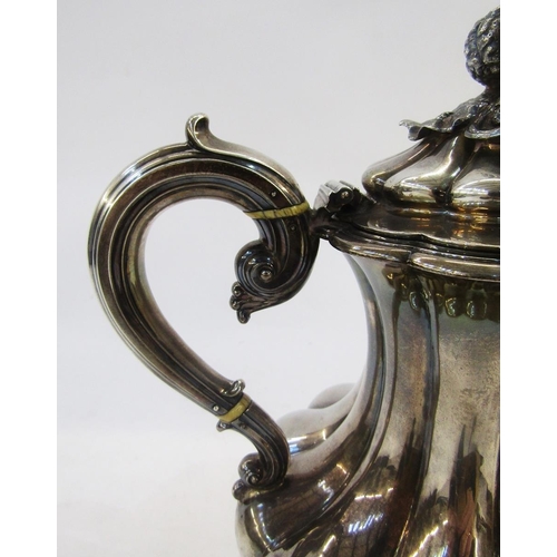 296 - William IV silver coffee pot, baluster shape and panelled with melon and foliate finial, scroll hand... 