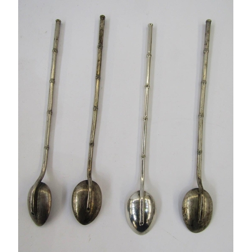 307 - Four Chinese silver coloured metal bamboo effect straw pattern spoons