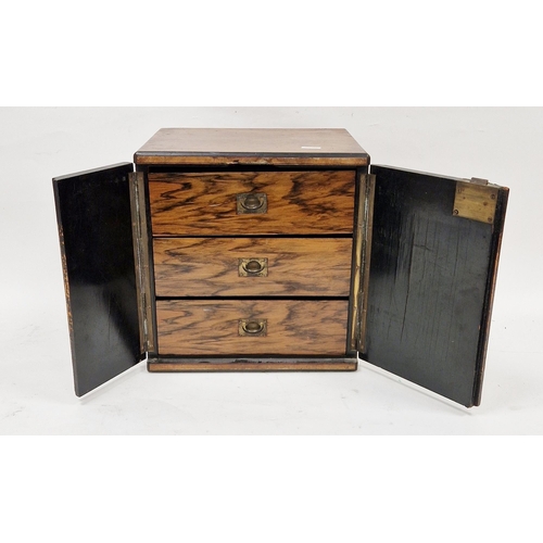 1002 - 19th century burr walnut and ebony table top cabinet, the two plain panel doors opening to three dra... 