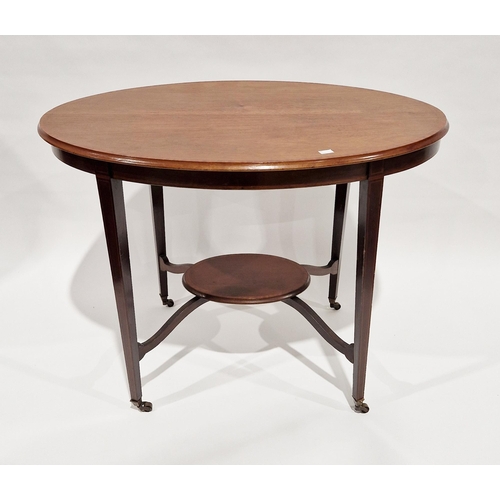 1058 - Edwardian mahogany cross-banded and inlaid oval side table, the four square tapering legs united by ... 