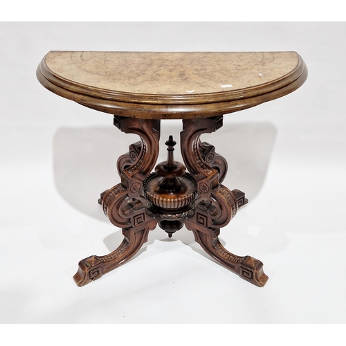 1061 - Victorian figured walnut demi-lune card table, the inlaid fold-over top opening to a burgundy playin... 