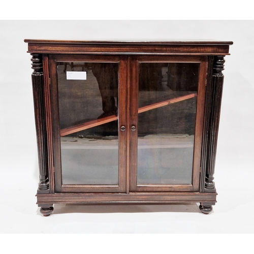 1100 - 19th century mahogany low glazed bookcase, the twin glazed doors flanked by fluted turned columns, o... 