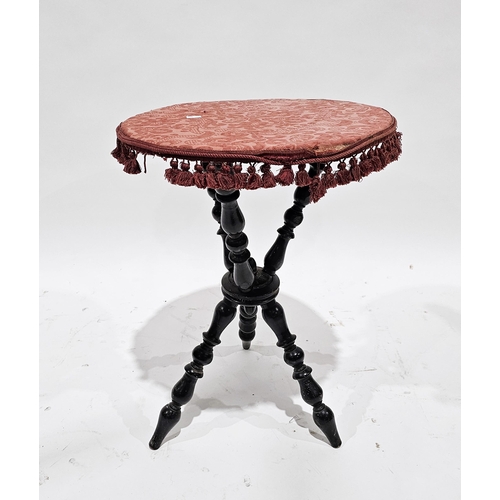 1127 - Victorian gypsy table, the circular fabric covered top with tassels (a/f) on an ebonised turned balu... 