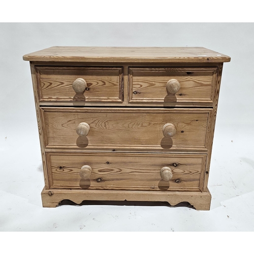 1129 - Modern small pine chest of two short over two long moulded drawers, the rectangular top with rounded... 