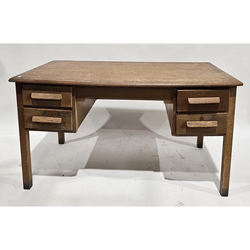 1144 - Early 20th century oak office desk, the rectangular top over an arrangement of four drawer, each wit... 