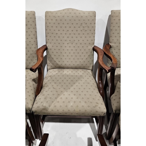 1160 - Set of 10 reproduction dining chairs, the fabric upholstery with riveted details, raised on stained ... 