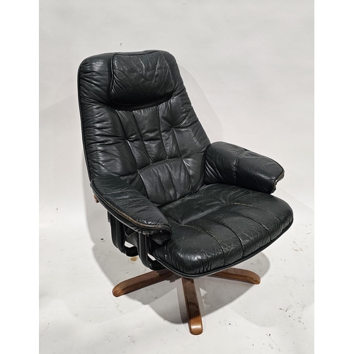 1163 - 20th century Ekornes-style Stressless swivel armchair, upholstered in green leather, on five splayed... 