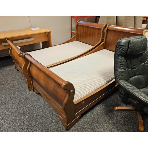 1165 - Two stained wooden veneered framed single sleigh beds (2)