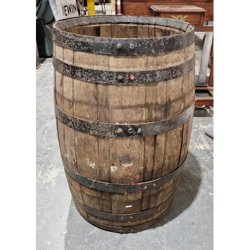 1169 - Large coopered oak and iron bound barrel, with hole for tap, 89cm high x approximately 57cm diameter... 