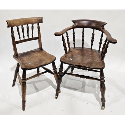 1190 - Victorian elm seated bow elbow chair with turned spindle back, on turned baluster legs terminating i... 