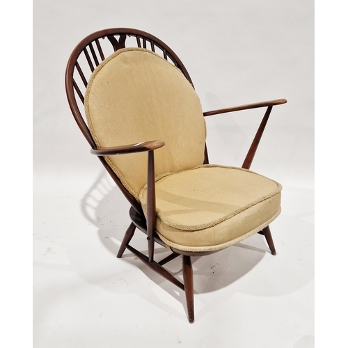 1202 - Ercol elm and beech wood open armchair in the fleur de lys pattern, with seat and back pads, Ercol s... 