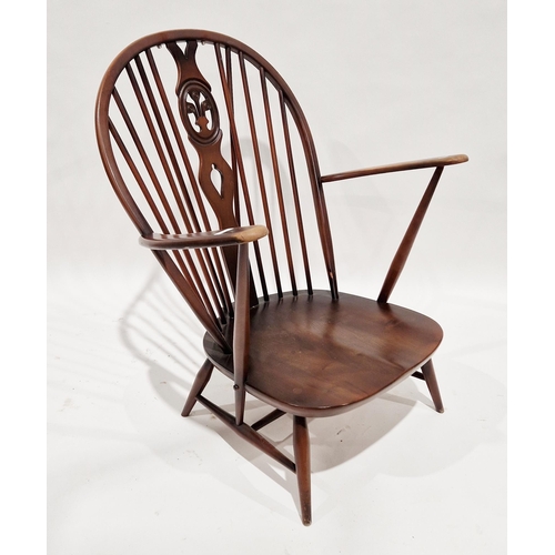 1202 - Ercol elm and beech wood open armchair in the fleur de lys pattern, with seat and back pads, Ercol s... 