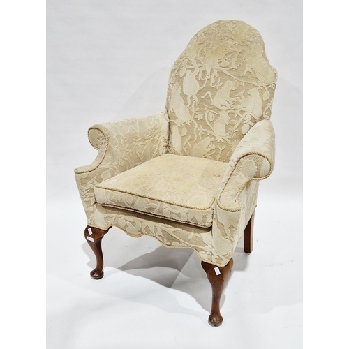 1203 - Early 20th century camel back armchair in the Queen Anne manner, with cream monkey pattered upholste... 