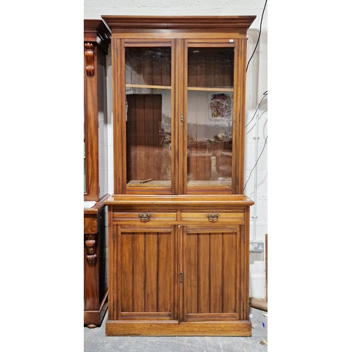 1216 - Late 19th / early 20th century mahogany glazed library bookcase, the moulded cornice over two glazed... 