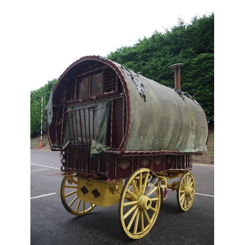 1220A - Early 20th century bow top Vardo/gypsy painted wagon, outer cabin painted in burgundy, gold and whit... 