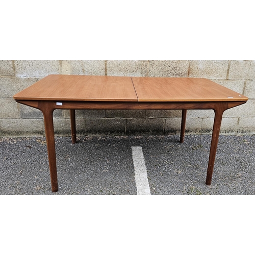 1225 - Mid-century teak extending dining table by McIntosh, the rectangular top on four turned legs, 74cm h... 