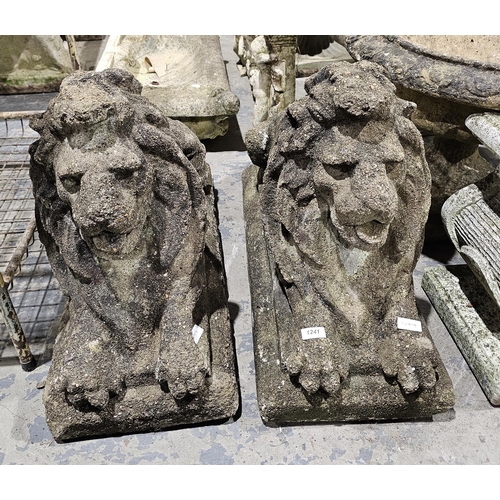 1241 - Pair of composite stone Chatsworth style garden recumbent lions, 50cm high x 70cm long

 Property of... 