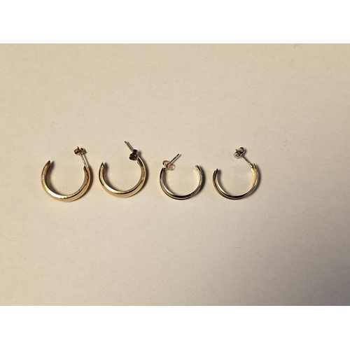 185 - Four half-hoop yellow metal stud earrings, the clasps on each stamped 375, gross weight 2.5g approx.