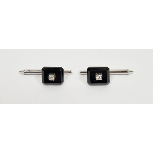 194 - Pair of Art Deco style 14k white gold shirt studs, each set with a diamond on an onyx panel, stamped... 