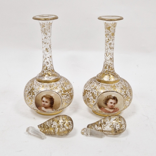 39 - Pair of late 19th century Bohemian decanters and stoppers, in the Moser-style, one with etched crown... 