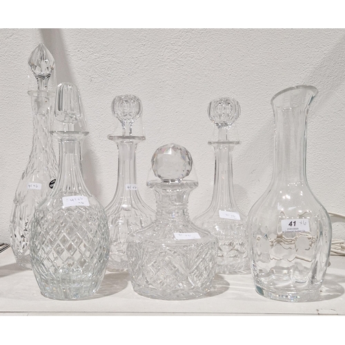 41 - Collection of decanters including a pair of Victorian globe and shaft examples cut with lenses, 30cm... 