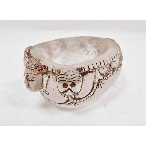 61 - Tibetan carved rock crystal skull cap bowl 'Capala', carved with stylised masks and swags enriched i... 