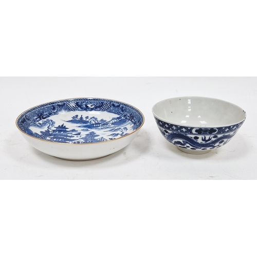 63 - Chinese export blue and white saucer and a Chinese porcelain-style tea bowl, each printed in blue an... 