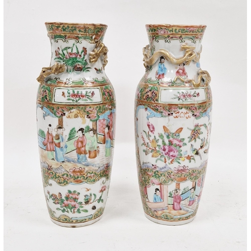 65 - Pair of Chinese Canton famille rose oviform vases, 19th century, each with frilled rim, applied in h... 