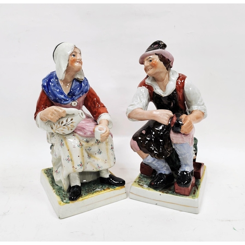 8 - Pair of Staffordshire pottery figures of a cobbler and companion, late 19th/early 20th century, each... 