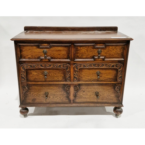 Early 20th century oak chest of drawers in the Jacobean manner, the ...