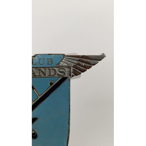 159 - Brooklands Aero-club enamel car mascot depicting a bi-plane in flight, stamped to reverse Spencer, L... 