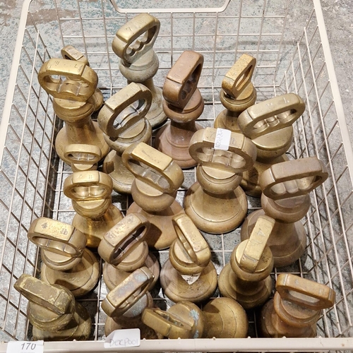 170 - Twenty brass bell weights with loop handles, all imperial, ranging from 7lb to 2lb