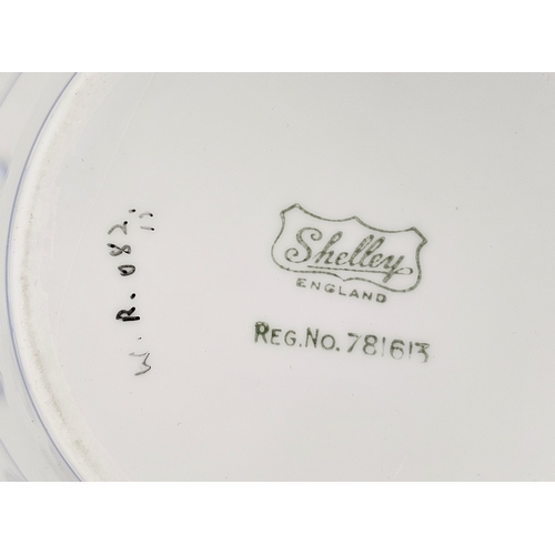 41 - Shelley Art Deco bone china part tea service, printed green marks, reg no 781613, decorated with pal... 